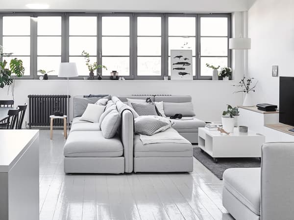 Sofa sections arranged back-to-back.