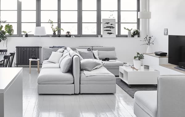 Sofa sections arranged back-to-back.