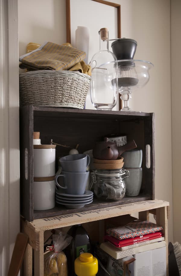 Some plant pot and other items, stored on shelves.