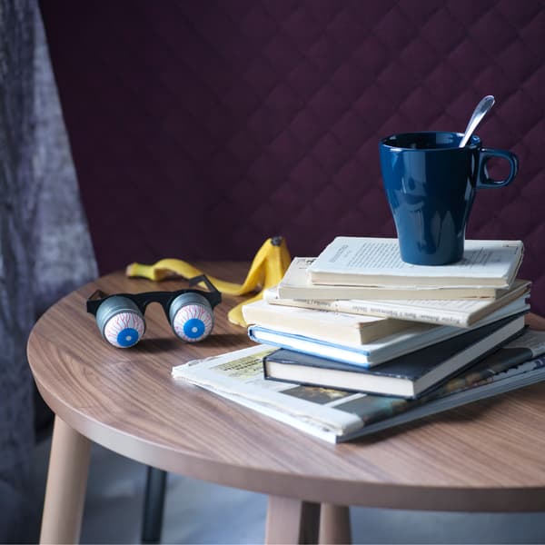 Sometimes just chilling out is the best time. A small side table for a stack of books and coffee makes all the difference.