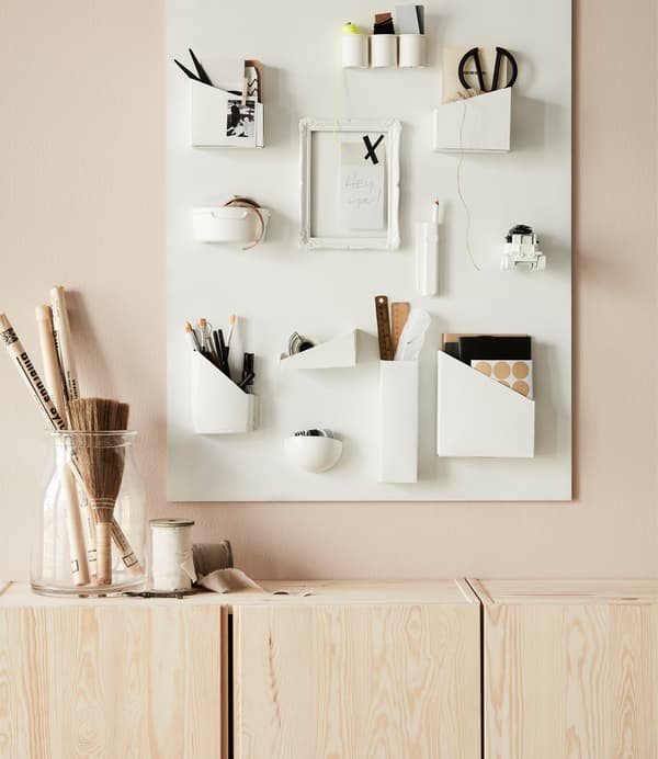 Sometimes the simplest things are the most beautiful – and smart! Use a couple of IVAR cabinets in untreated wood to store things you want to hide away.