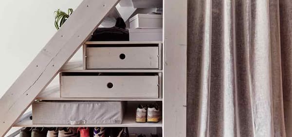 Storage under stairs with Curtain to hide away