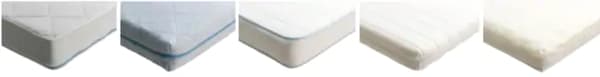 The corners of five different IKEA crib mattresses side by side.