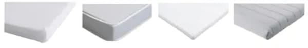 The corners of four different IKEA crib mattresses side by side.