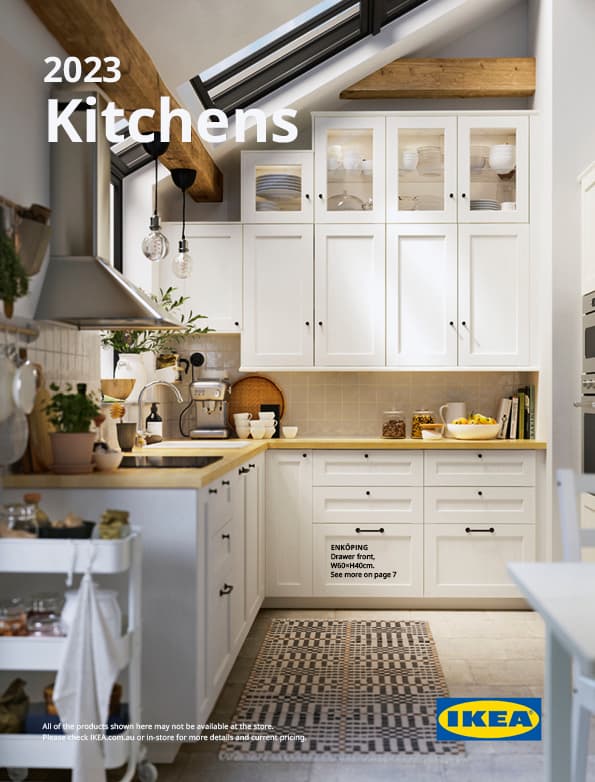 The cover of an IKEA Kitchens brochure showing a cooking area with stove, oven, microwave and extractor hood.