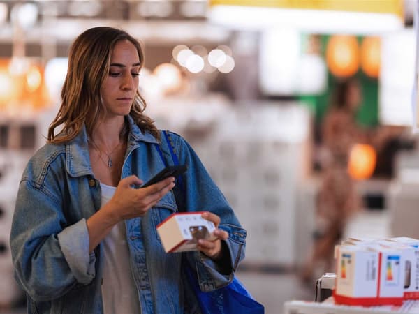 The customer scans the product in the store using the IKEA app.