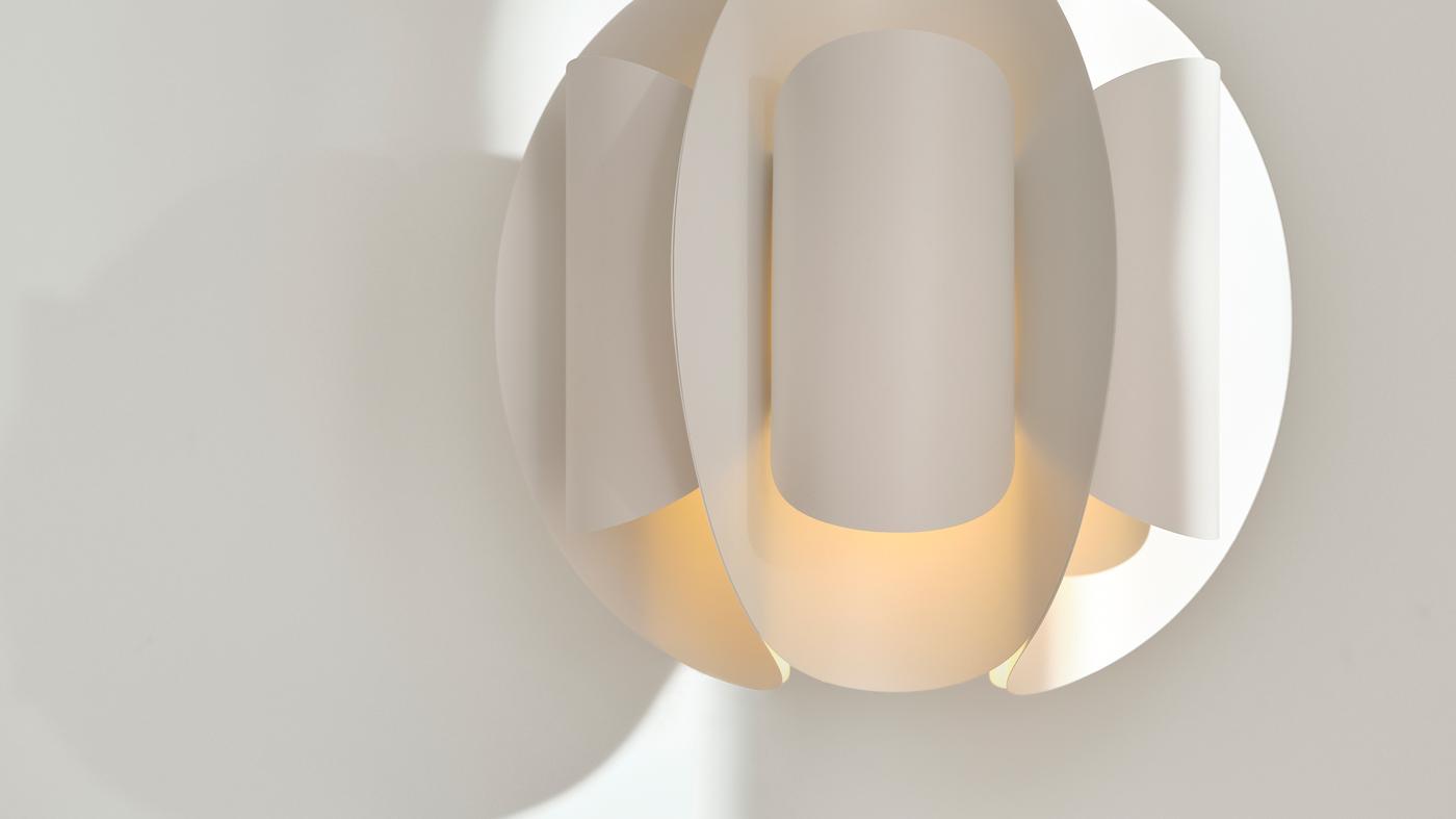 The folded form and soft diffused light of the TRUBBNATE pendant lampshade is easy to appreciate up close.