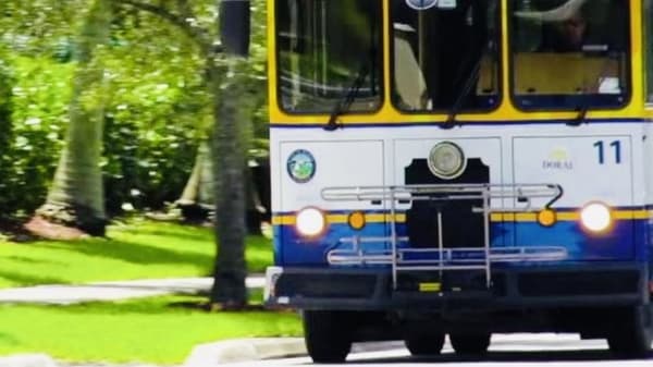 The front of a Doral City Trolley.
