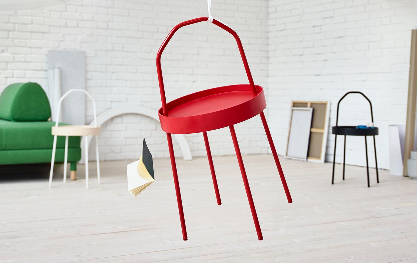 The new BURVIK side table in red, black and birch.