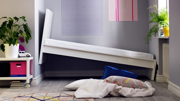 Tilted White Bed