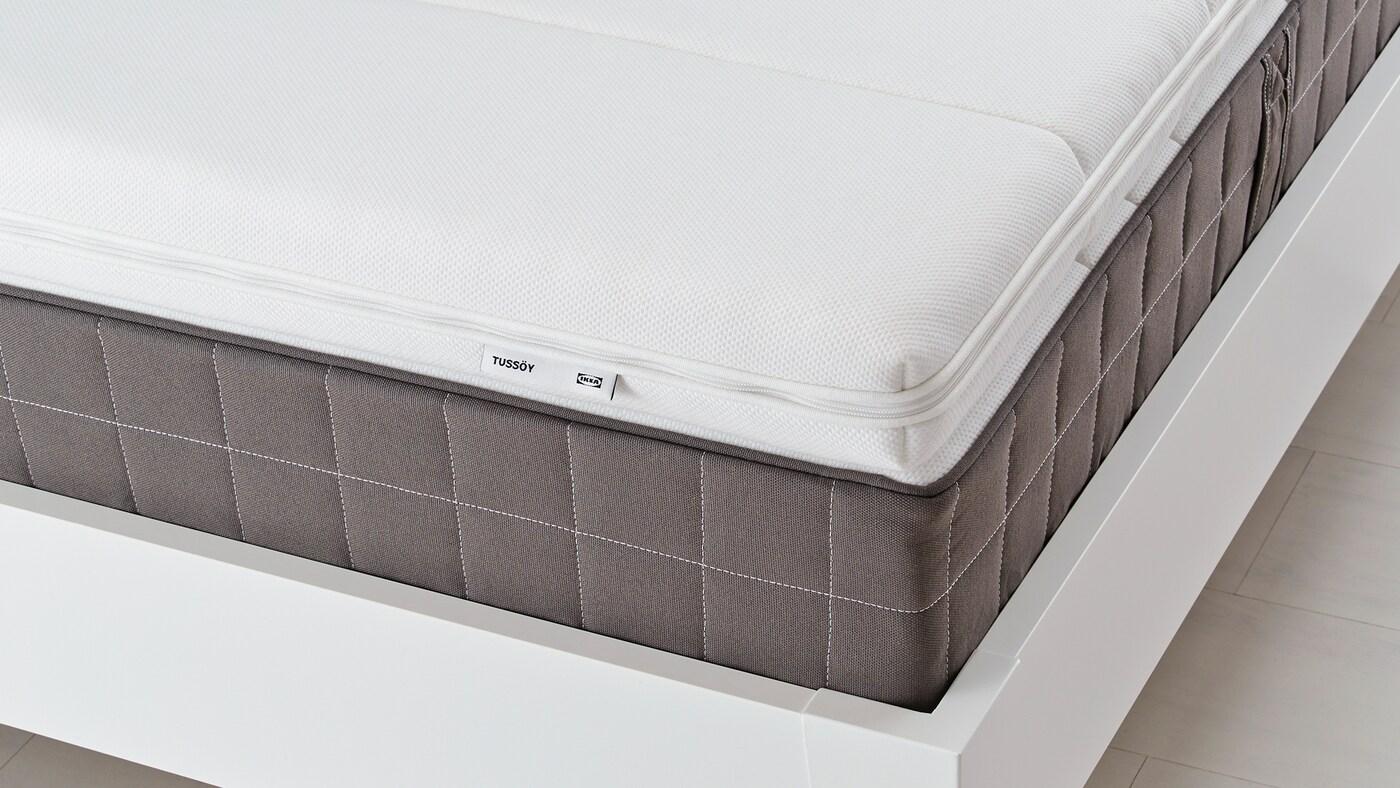 TUSSÖY white mattress pad.
