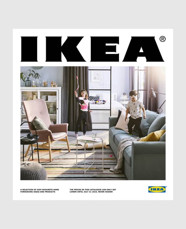 Two children in a living room on the cover of the new IKEA 2019 catalogue.