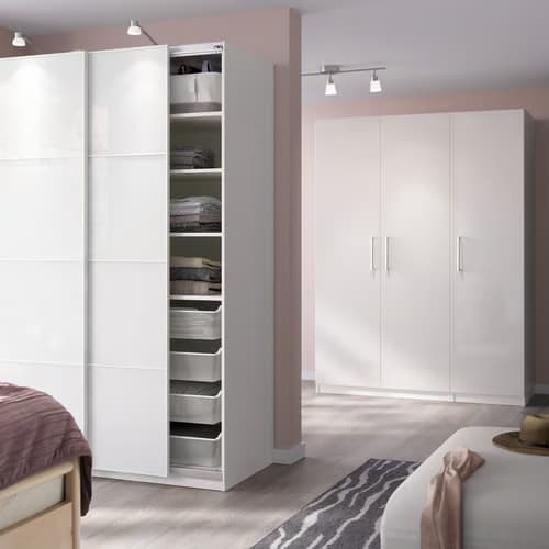 Two different PAX frames in the bedroom area, with sliding doors and hinged doors. 