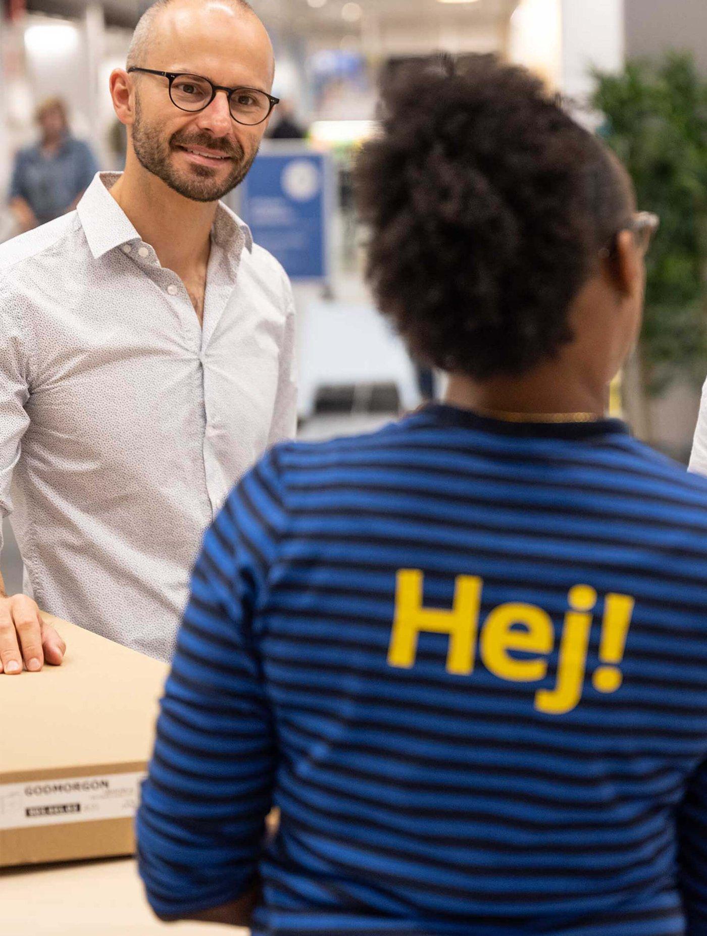 two people talking at IKEA