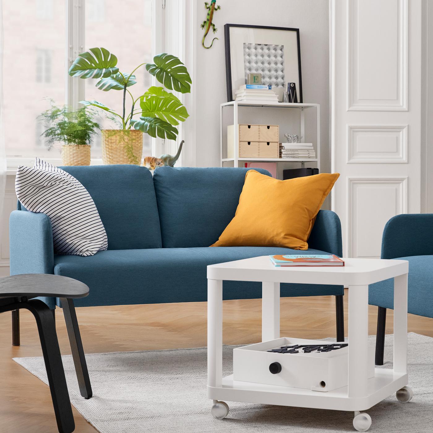 View this simple living room, furnished with GLOSTAD sofa, TINGBY sofa table with casters and more; all under ₱15,000!