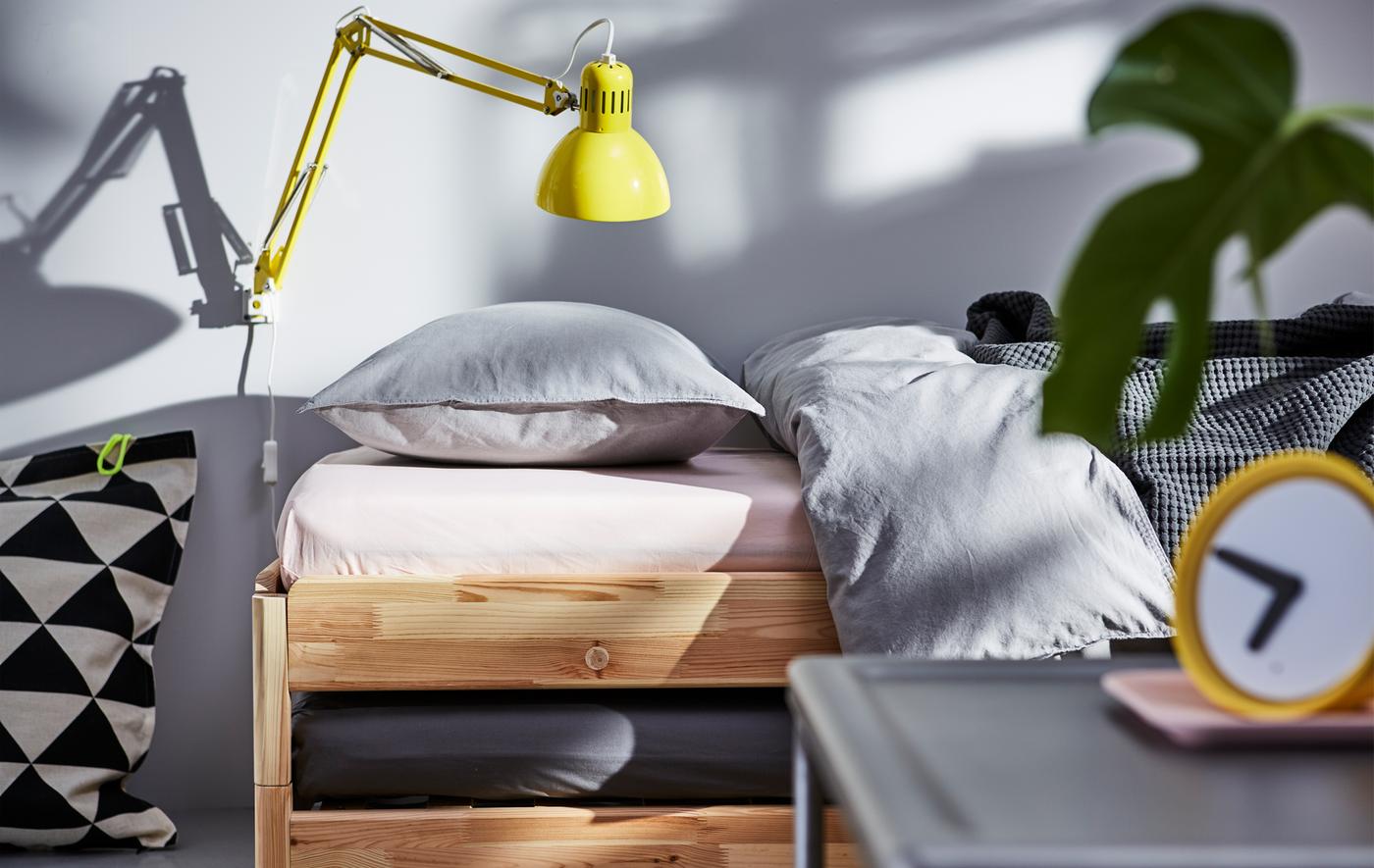 Want clever ideas for your small bedroom? Go for a bed that can be used both as a bed and a sofa, such as IKEA UTÅKER!