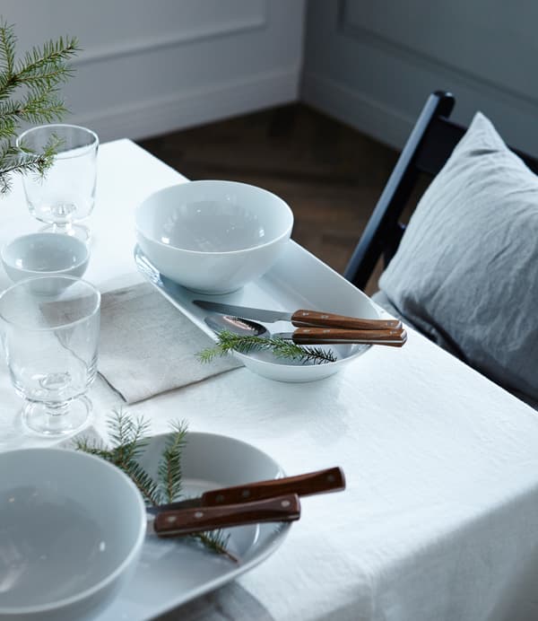 Want to win a few wows with your table setting? Think about under the table too. Stuff like rugs, cushions or textiles on the table legs bring a big boost to your celebrations look. 