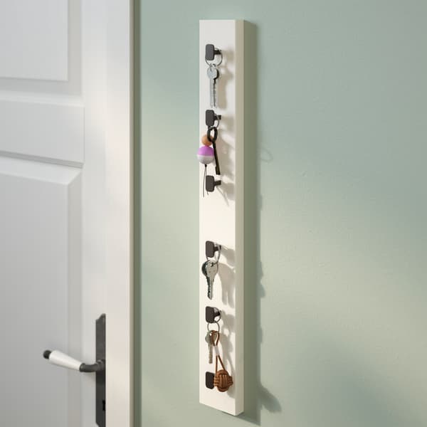 Want wall storage ideas for your hall? Try this idea with IKEA LURT rack hanging vertically to become the perfect place to hang up keys (next to the door). Just attach modern knobs, such as HACKÅS!