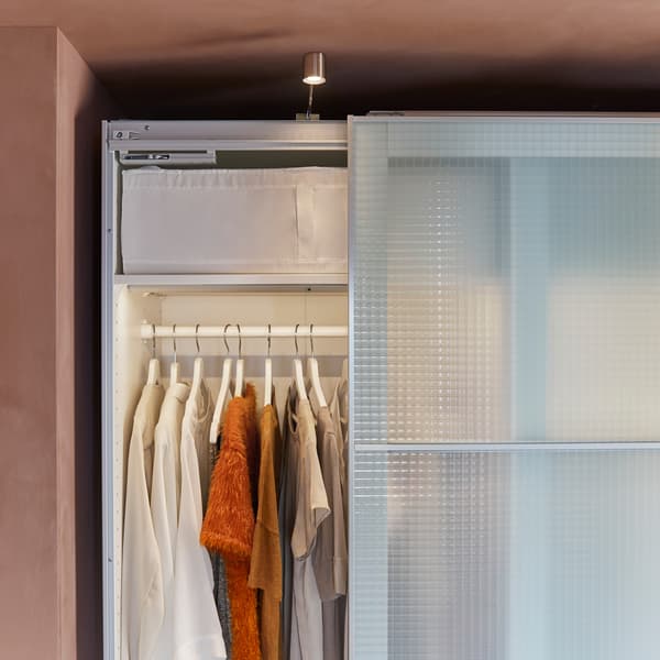 Wardrobe with frosted glass sliding doors