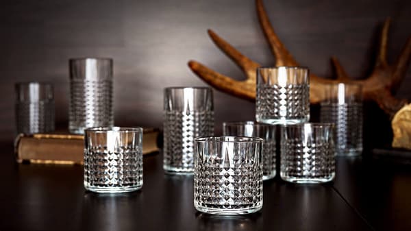 Whiskey glass on black table