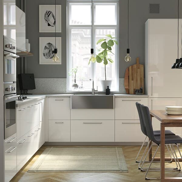 white kitchen with big windows