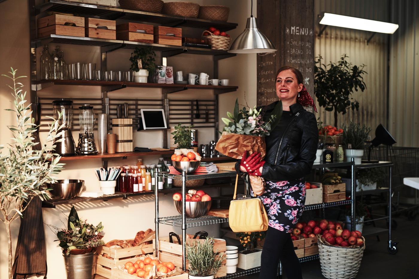 Woman standing in her store