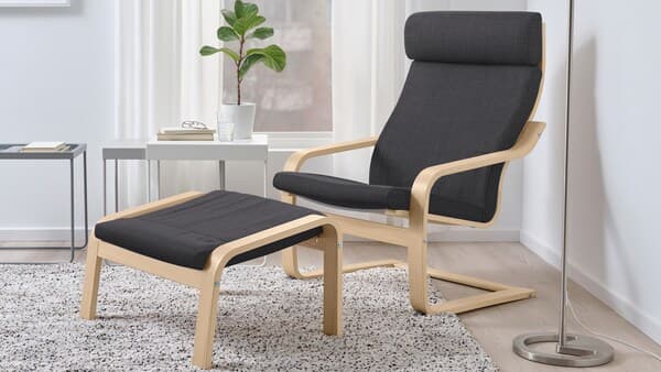 Wooden POÄNG armchair with footstool. 