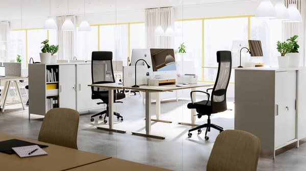Workspace area with desks and chairs