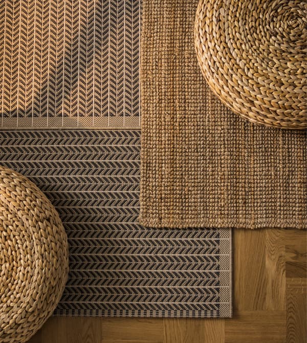 Woven rugs and stools are shown from above.
