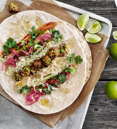 Wrap with Veggie balls, hummus and pickled red onion
