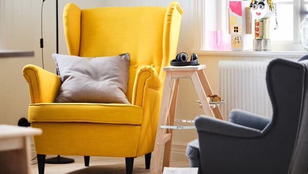 Yellow STRANDMON wingchair.