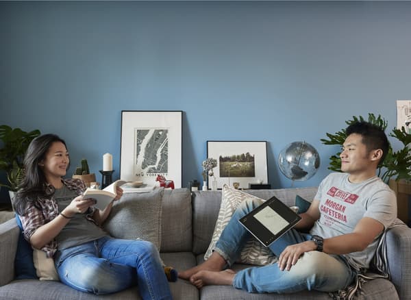Yiqing and Derrick in their living room.