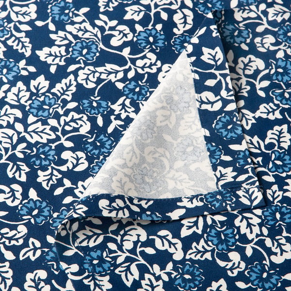 Floral blue and white cotton-viscose bedsheet, closeup showing soft fabric and secure stitching.