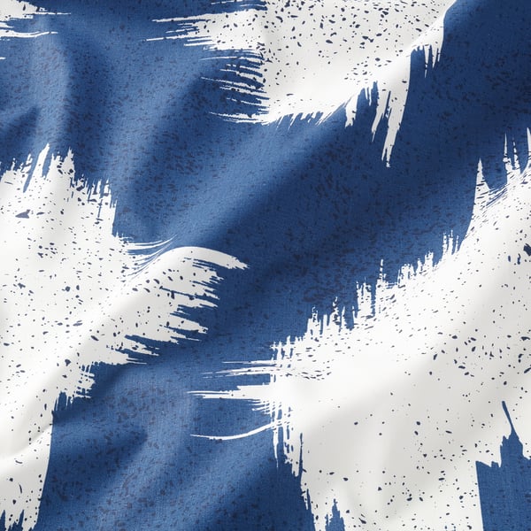Blue and white abstract pattern on soft cotton fabric.