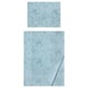 Blue ALPTALL bedding: floral pillow & folded blanket with animal design.