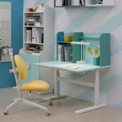 Blue adjustable desk with tilt, storage, and accessories for kids study.