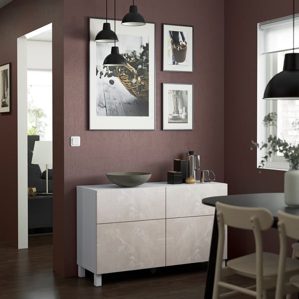 Modern living room with BESTÅ sideboard, marble effect, art, & storage.