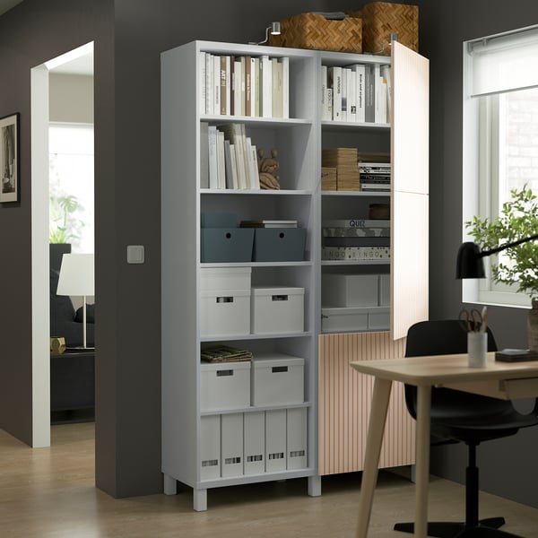 Modern office with BESTÅ storage and workspace.