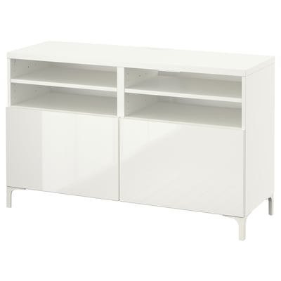 White BESTÅ tv stand, minimalist design with open shelves and cabinet.