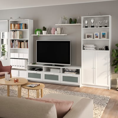 Modern living room with BILLY bookcases, tv, and decor.