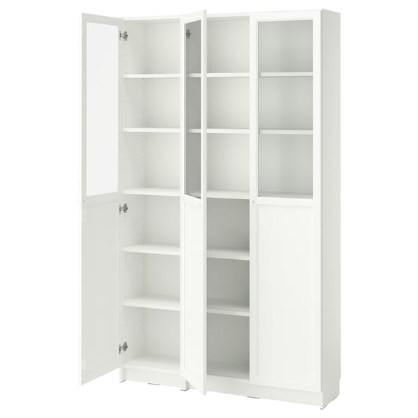 A white BILLY bookcase with glass doors, featuring multiple adjustable shelves for storage.