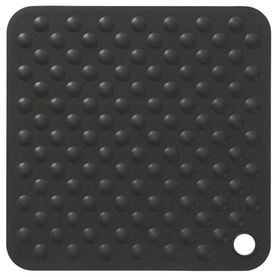 A black square BLÅSJÖN bathtub mat with numerous suction cups for secure grip, designed for safety and comfort in the bathroom.