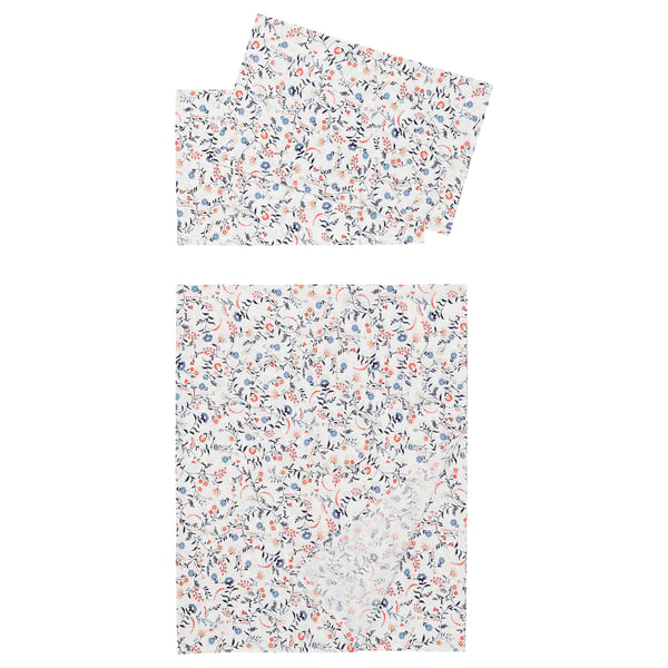 Image shows white cotton bedding set with blue and orange floral patterns, including a flat sheet and folded pillowcases.