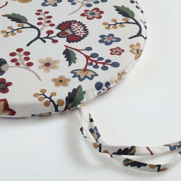 Floral cushion with ties. Soft foam filling, bright colours.