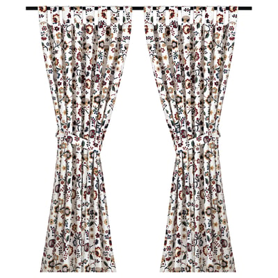BRUNÖRT floral curtains, white with red, yellow, and blue flowers. Made from 100% cotton with tab headings.