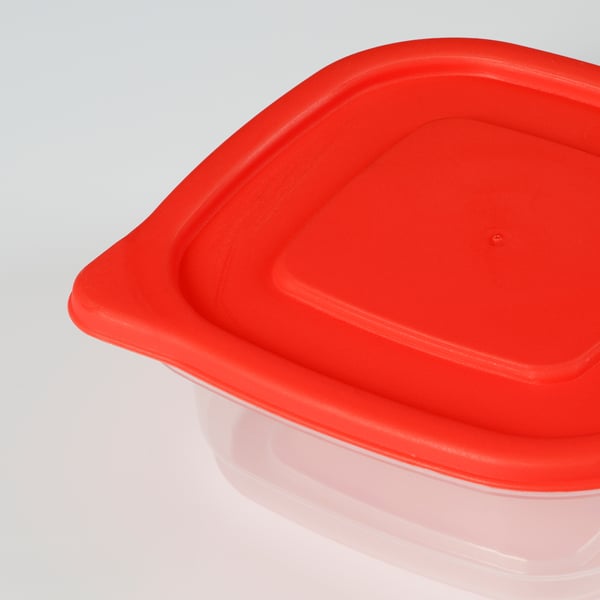 Bright red plastic container with a clear base, sealed with a secure lid, ideal for food storage.