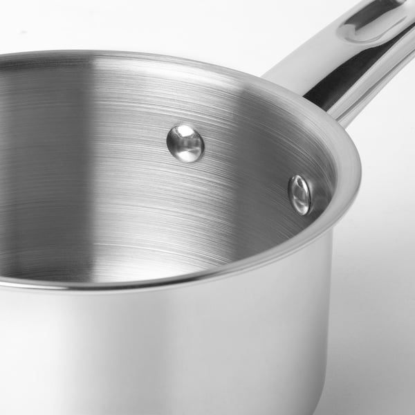 Stainless steel saucepan with long handle, glossy finish. High-quality, durable construction with evenly distributed heat.