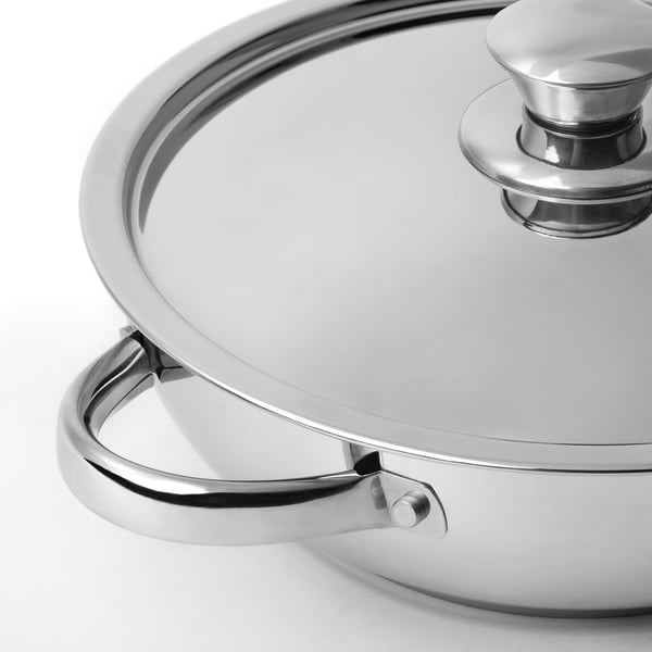 Stainless steel pan lid and handle. Smooth, robust design. Ideal for even heat distribution.
