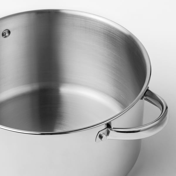 Shiny stainless steel saucepan with sturdy handle, smooth interior, and polished finish, reflecting excellent quality and durability.