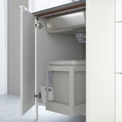 Open ENHET cabinet with sink and storage for waste sorting.